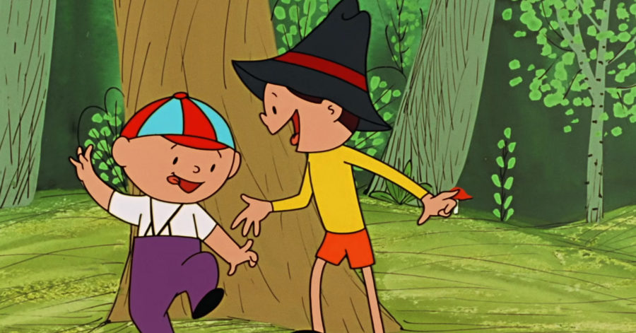 Kadr z kreskówki, dwaj chłopcy – Bolek i Lolek podróżują po lesie, jeden z nich tańczy, drugi mu się przygląda z uśmiechem.